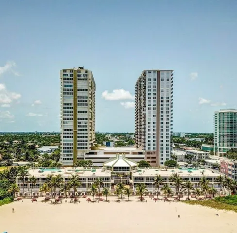 a view of a city with tall buildings