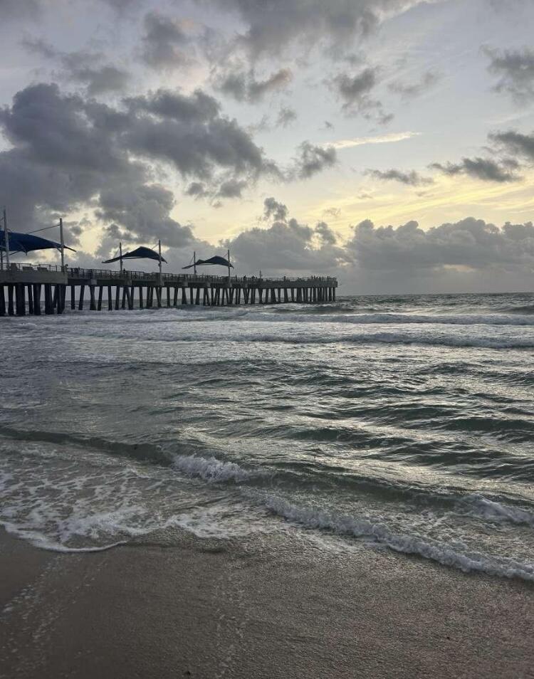 111 Briny Avenue, Unit 703 Pompano Beach, FL 33062 - Photo 13 of 19 a view of a big room with wooden fence