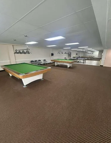 a room with pool table