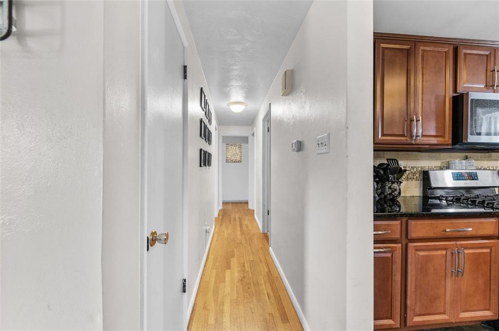 708 Hancock Street Perryopolis, PA 15473 - Photo 13 of 36 a view of a kitchen from the hallway