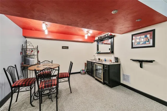 a view of a chairs and table in a room