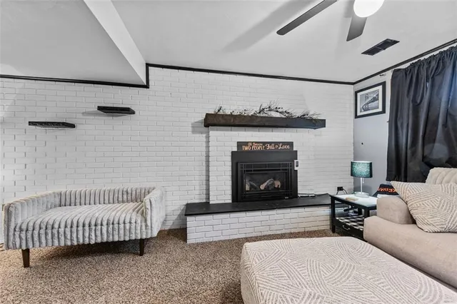 a living room with a couch and a flat screen tv
