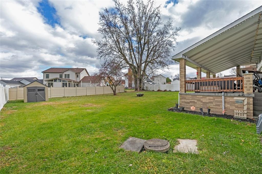 708 Hancock Street Perryopolis, PA 15473 - Photo 31 of 36 a view of a backyard with sitting area