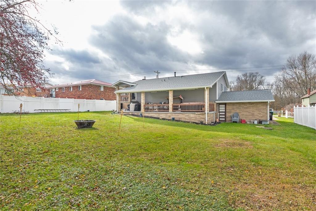 708 Hancock Street Perryopolis, PA 15473 - Photo 34 of 36 a view of a house with a garden