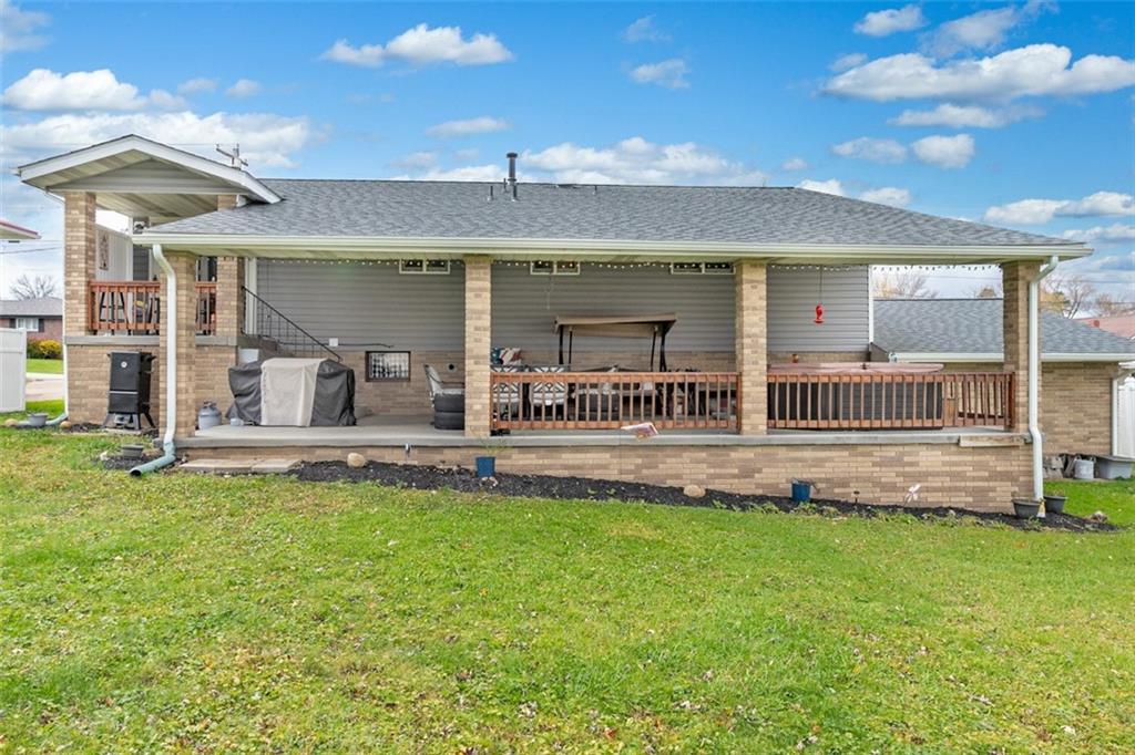 708 Hancock Street Perryopolis, PA 15473 - Photo 35 of 36 a view of a house with a backyard and a patio