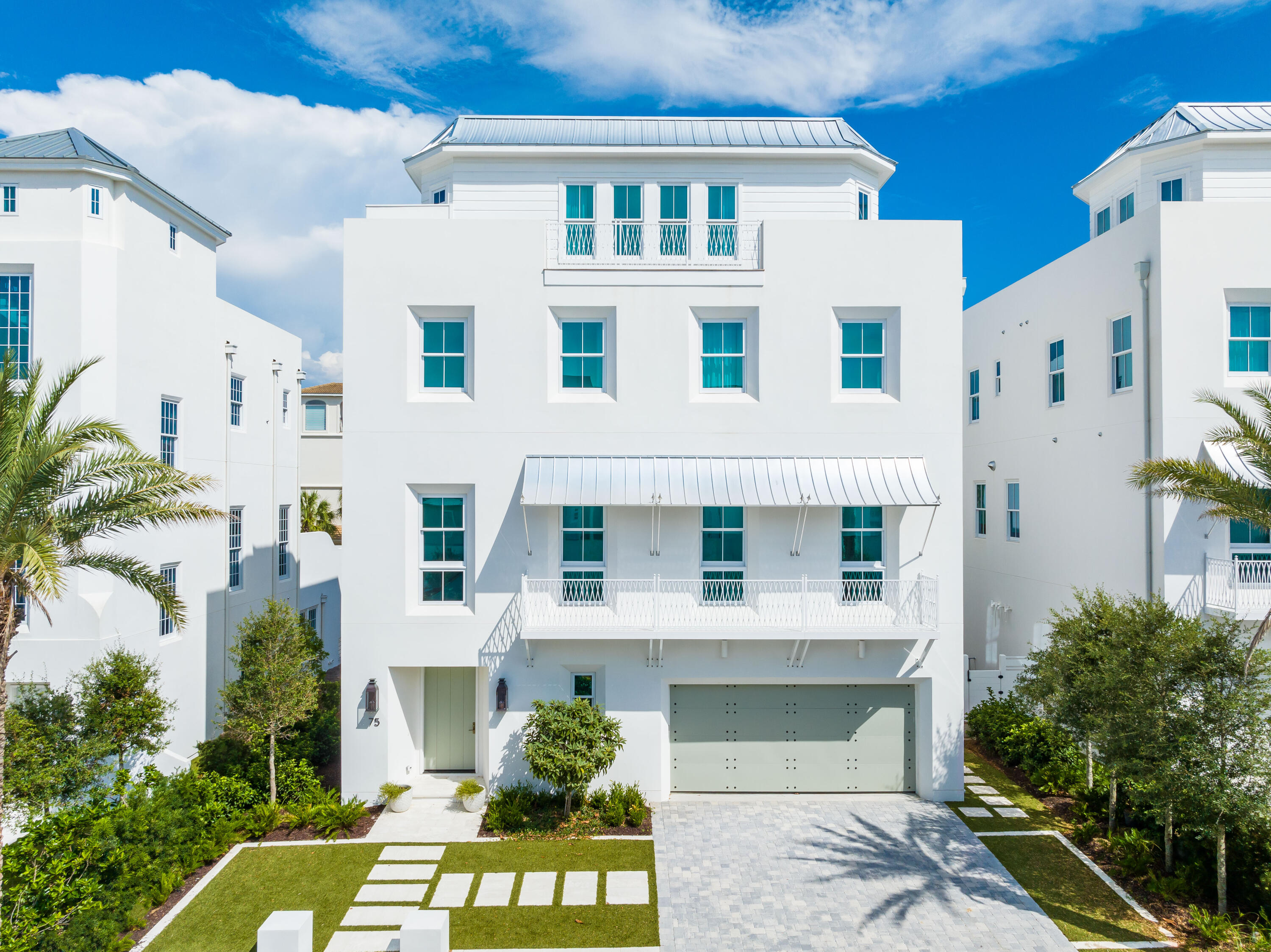 Lot 14 Elysee Ct Inlet Beach Inlet Beach, FL 32461 - Photo 2 of 50 a view of building with large windows and plants