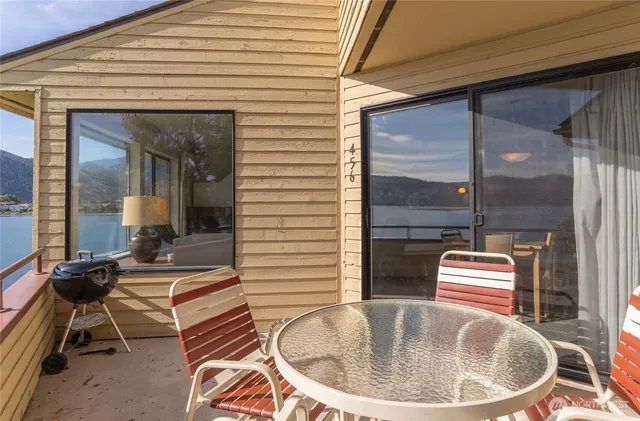 a dining room with a table and chairs