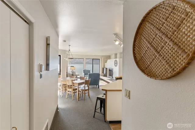 a view of a livingroom with furniture and wooden floor
