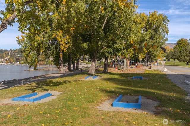 a view of a terrace with a table and chairs