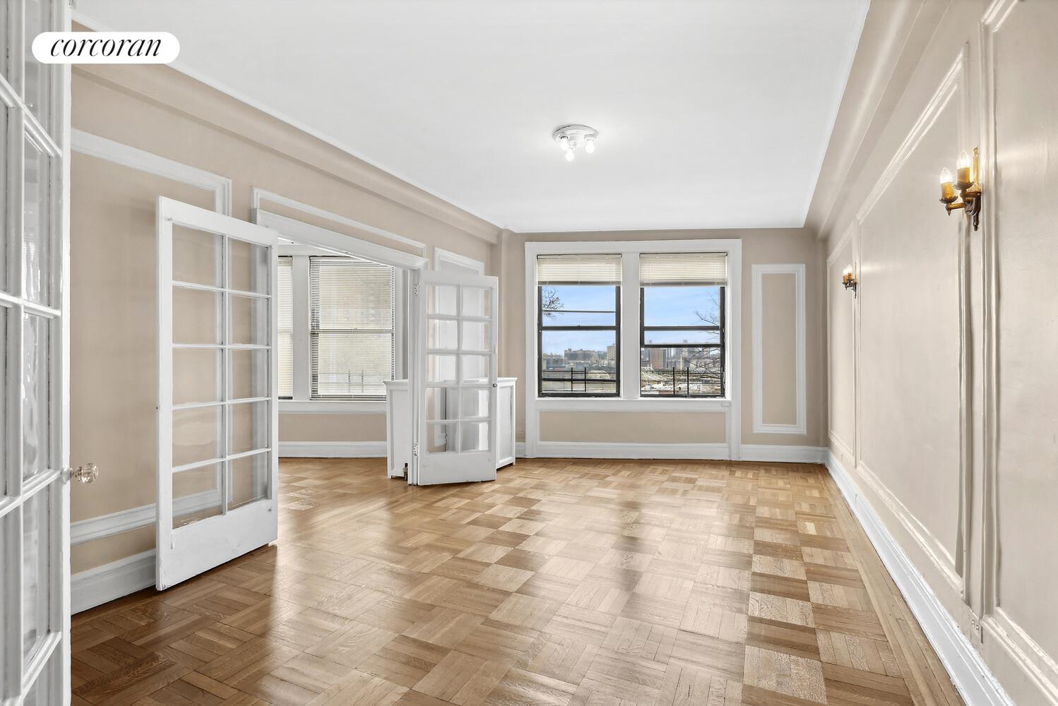 409 Edgecombe Avenue, Unit 2A Manhattan, NY 10032 - Photo 1 of 19 a view of an empty room with a window