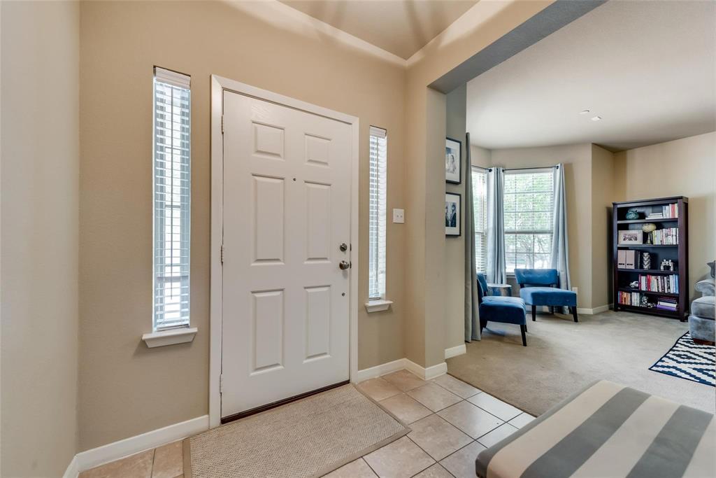 3943 Asbury Lane Addison, TX 75001 - Photo 4 of 29 a view of a livingroom with furniture and windows