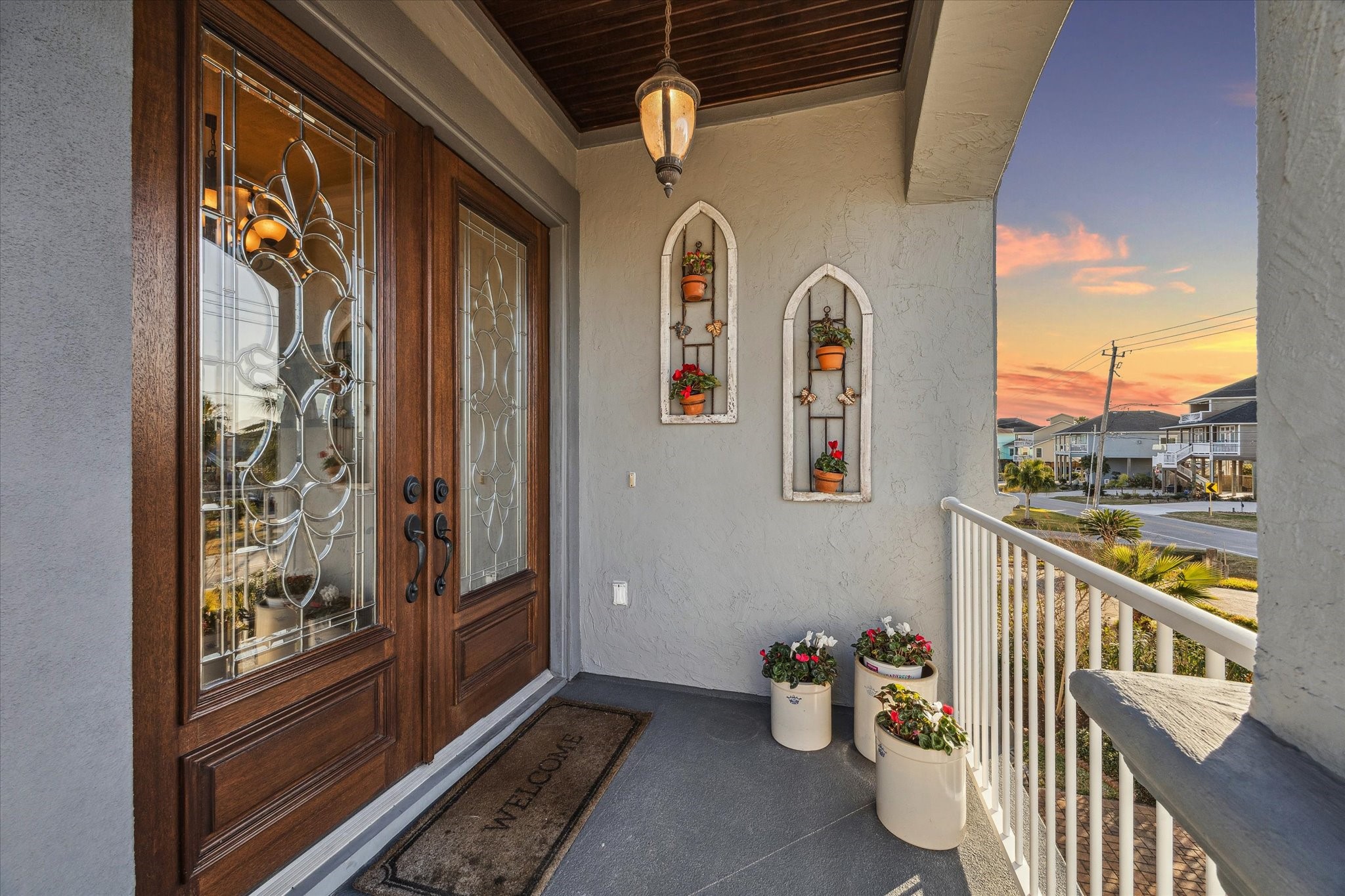 1406 Todville Road Seabrook, TX 77586 - Photo 10 of 50 THE FRONT PORCH OPENS TO DOUBLE DOORS WITH LEADED GLASS.