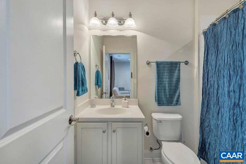 2059 Avinity Loop Charlottesville, VA 22902 - Photo 9 of 40 a bathroom with a sink vanity mirror and toilet