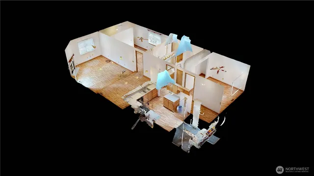 an aerial view of a house with backyard