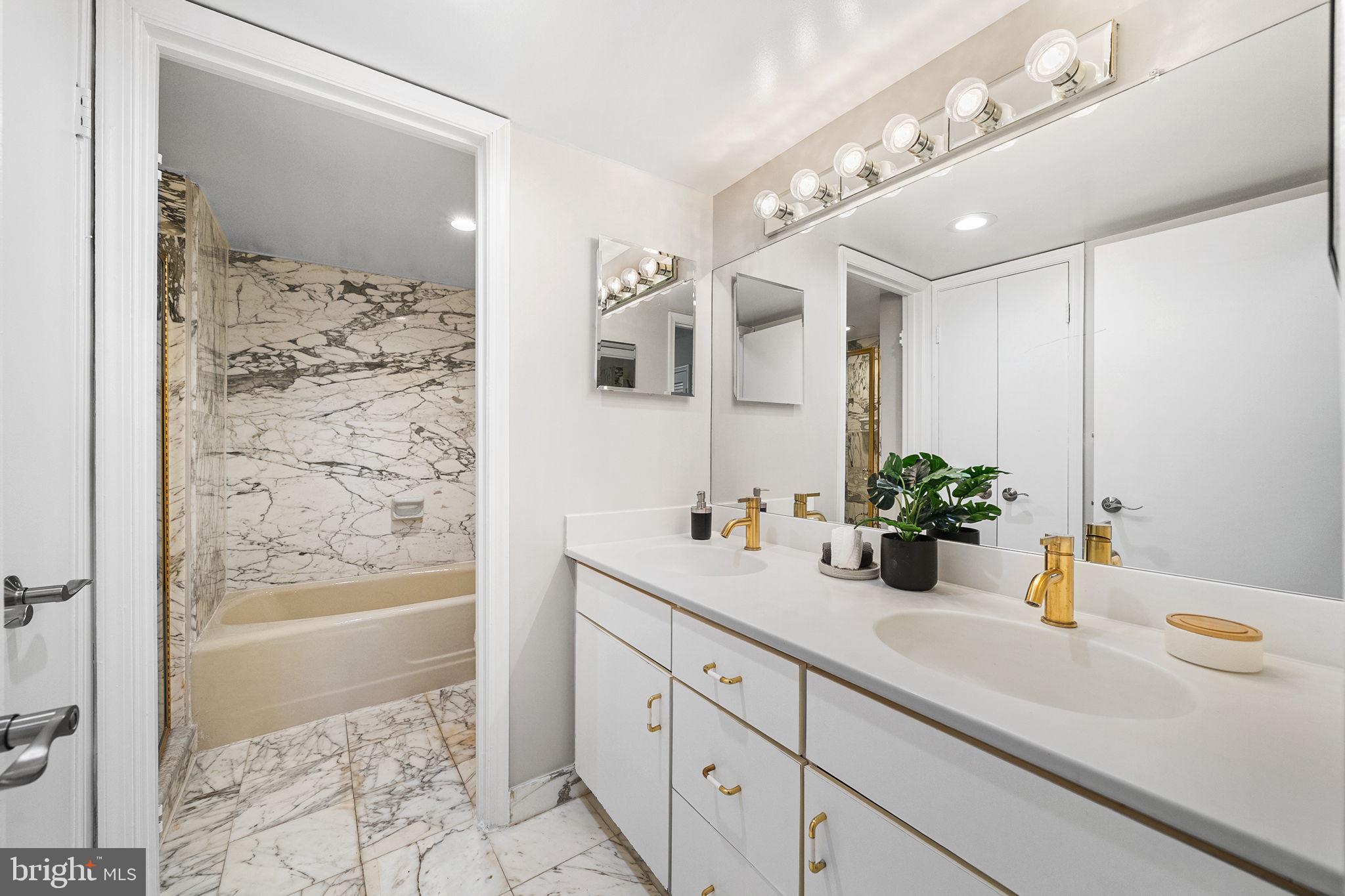 1101 South Arlington Ridge Road, Unit 212 Arlington, VA 22202 - Photo 39 of 93 Updated flush-mount mirror and medicine cabinet