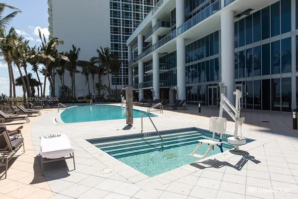 a view of yard with patio