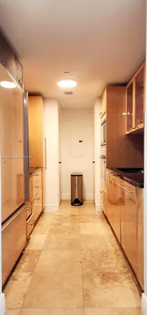 a view of empty room with a large window