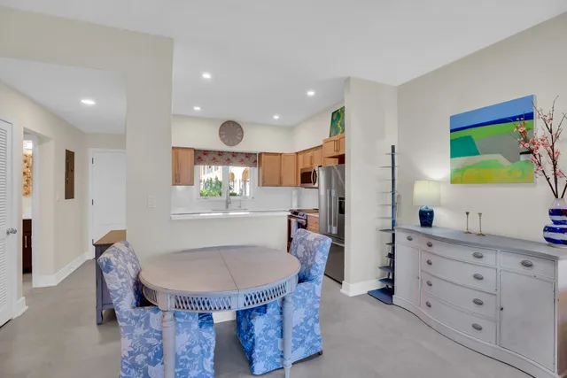 a view of a kitchen and dining room