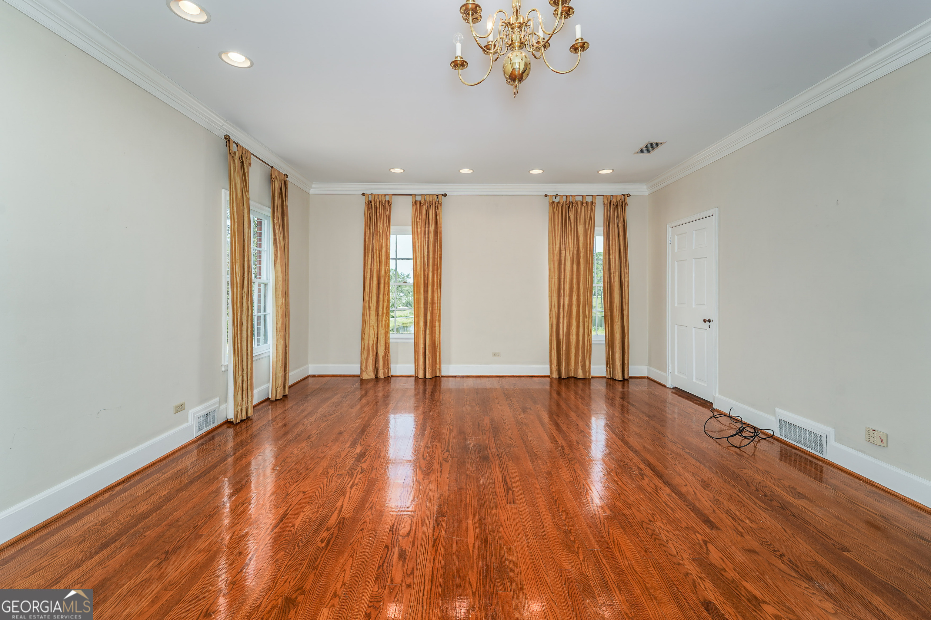 1602 Ward St Extension West Douglas, GA 31533 - Photo 53 of 70 a view of an empty room with wooden floor and a window