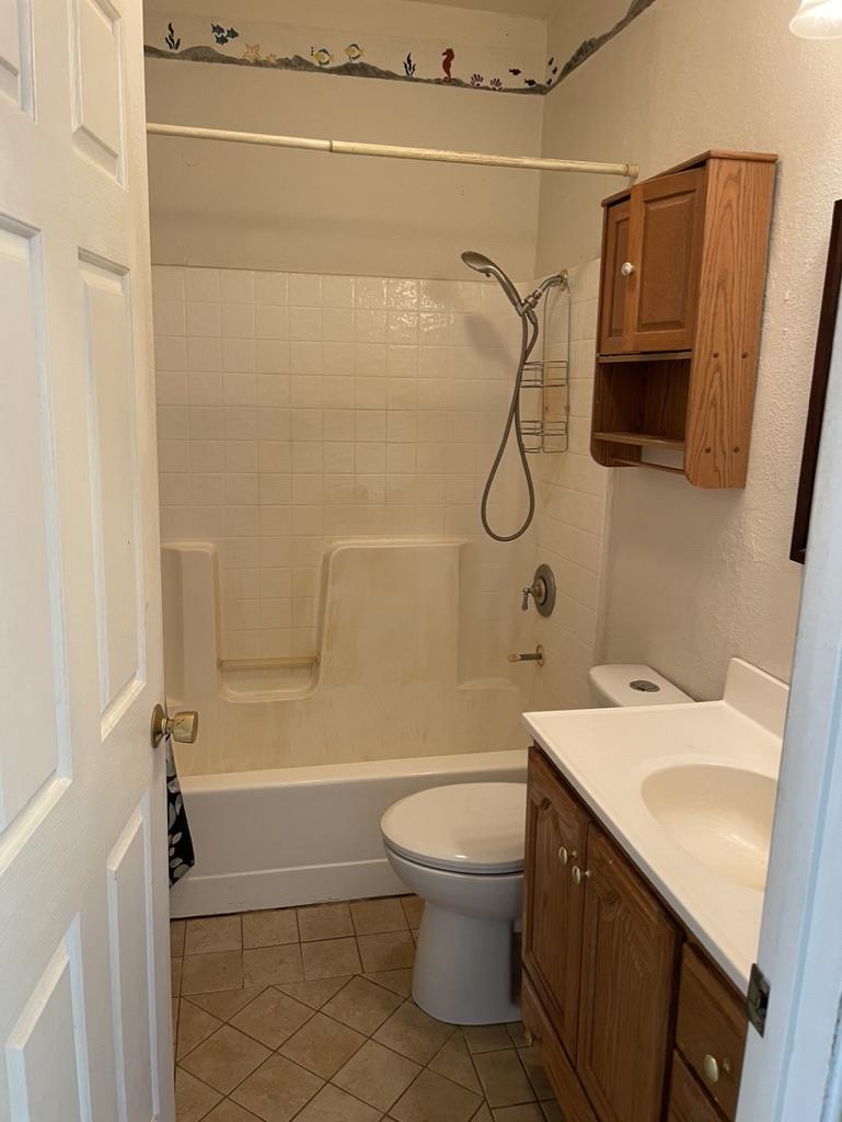2385 Lakeview Loop Stonyford, CA 95979 - Photo 17 of 20 a bathroom with a granite countertop shower a sink and toilet