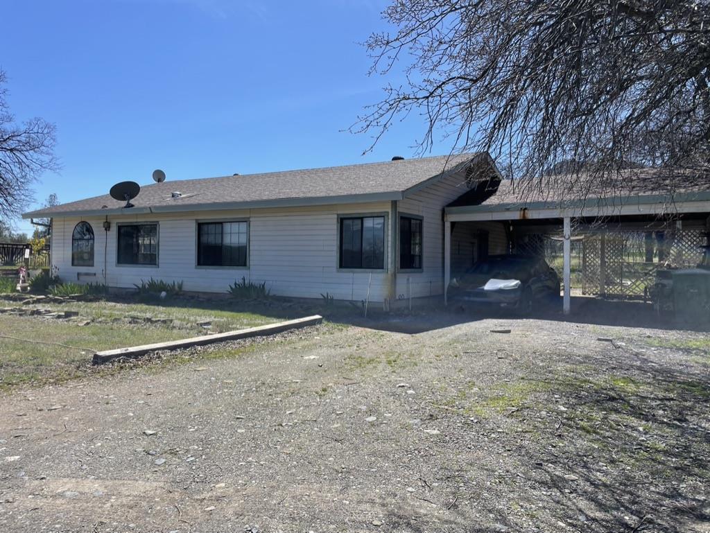 2385 Lakeview Loop Stonyford, CA 95979 - Photo 4 of 20 a front view of a house with a yard