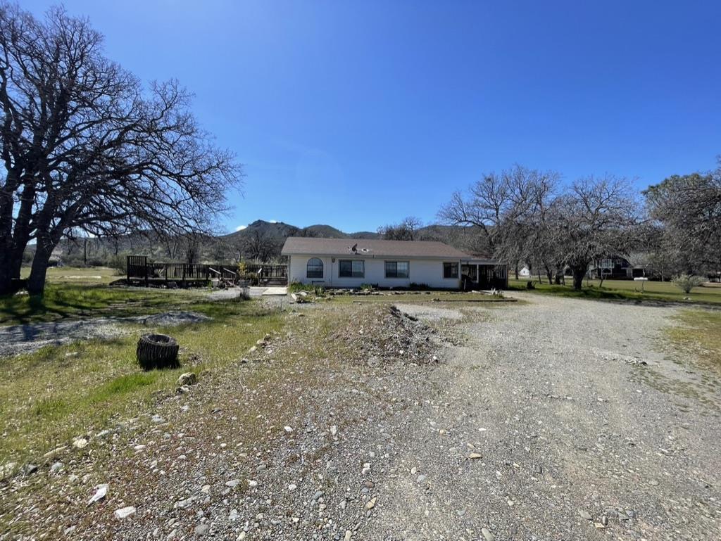 2385 Lakeview Loop Stonyford, CA 95979 - Photo 5 of 20 a view of house with huge green field and trees