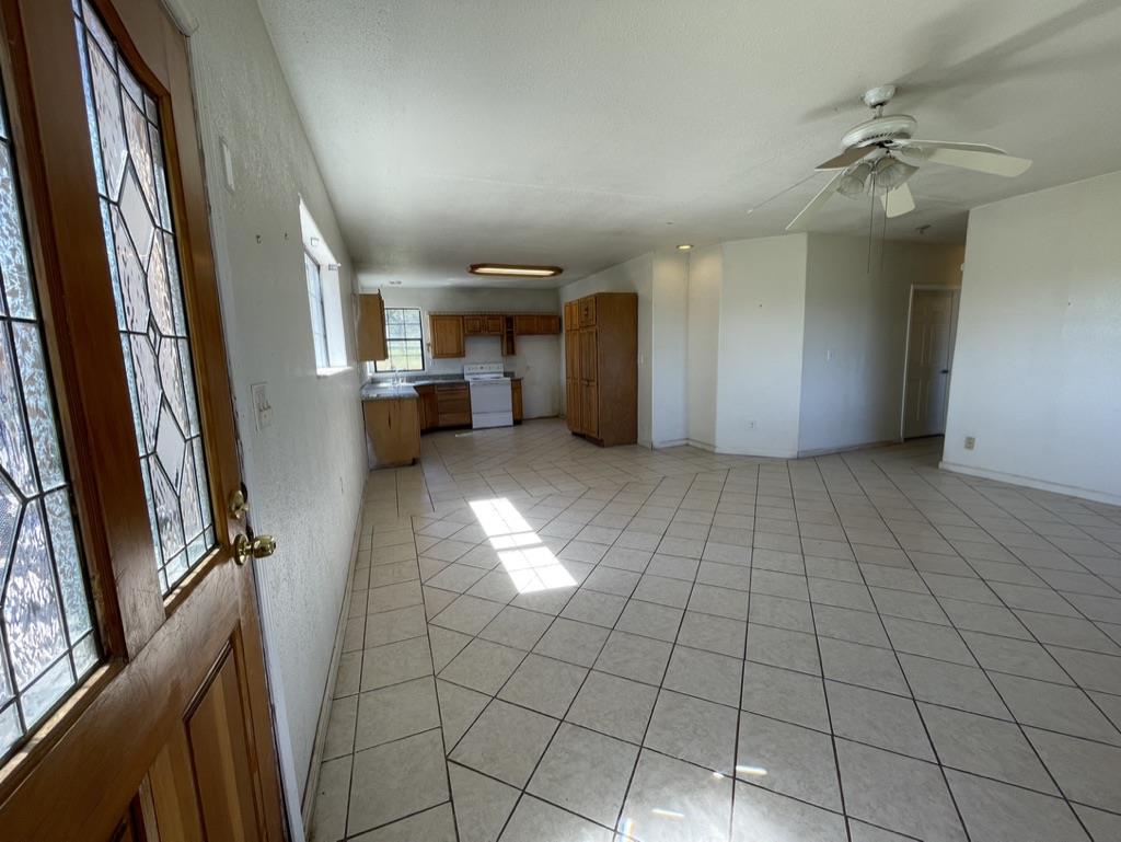 2385 Lakeview Loop Stonyford, CA 95979 - Photo 8 of 20 a view of a livingroom with furniture and an empty room