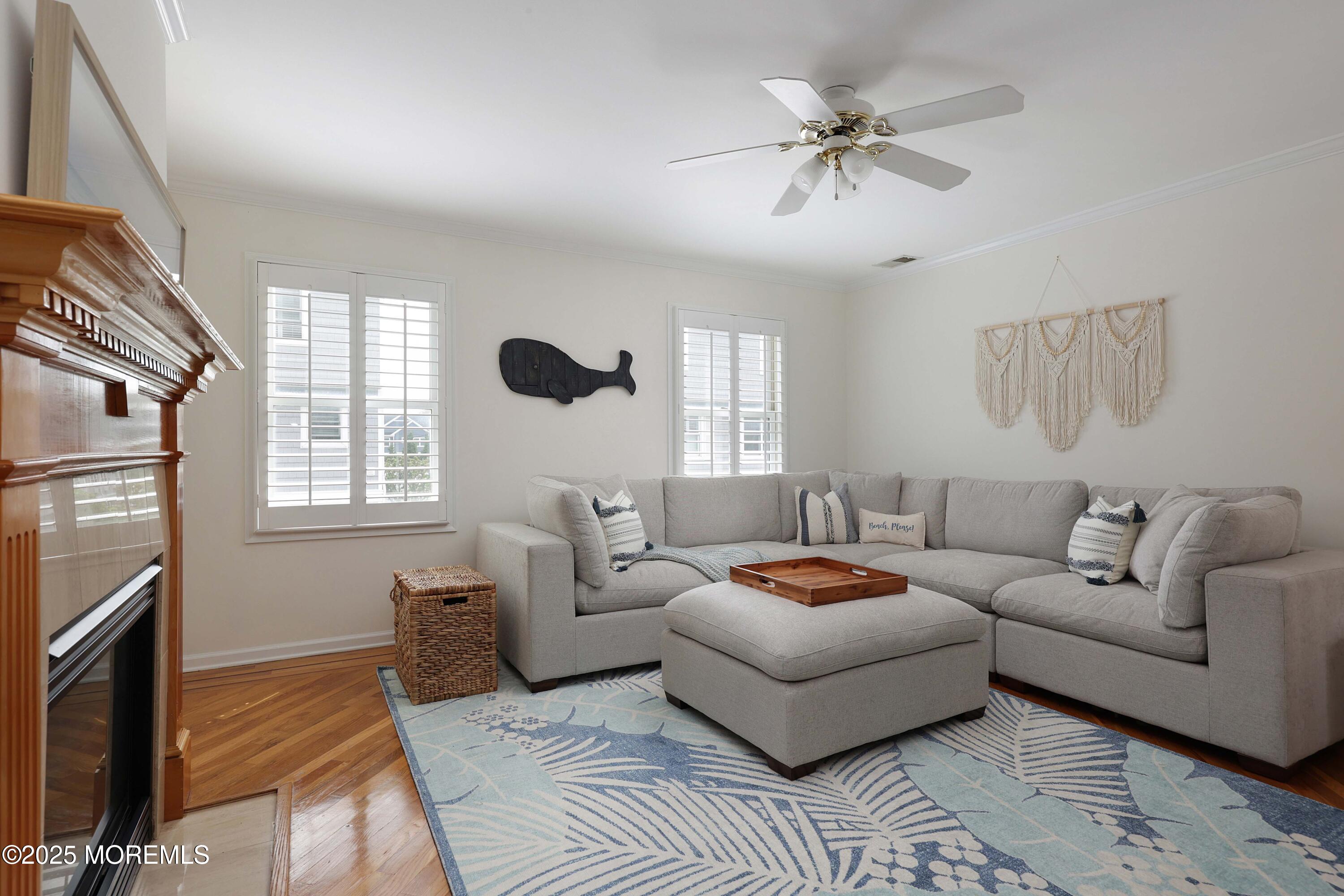 200 2nd Avenue, Unit 14 Belmar, NJ 07719 - Photo 14 of 32 a living room with furniture and a window