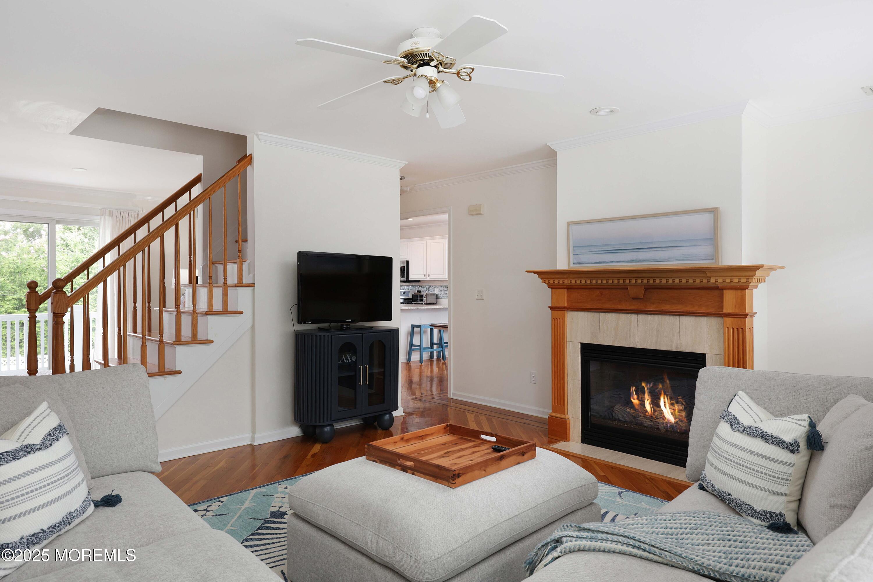 200 2nd Avenue, Unit 14 Belmar, NJ 07719 - Photo 15 of 32 a living room with furniture and a fireplace