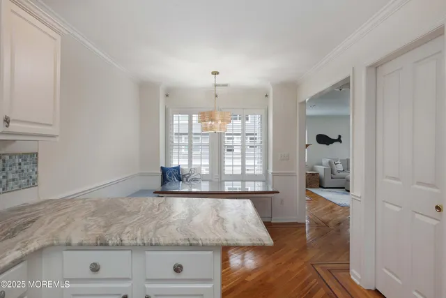 a bathroom with a sink toilet and mirror