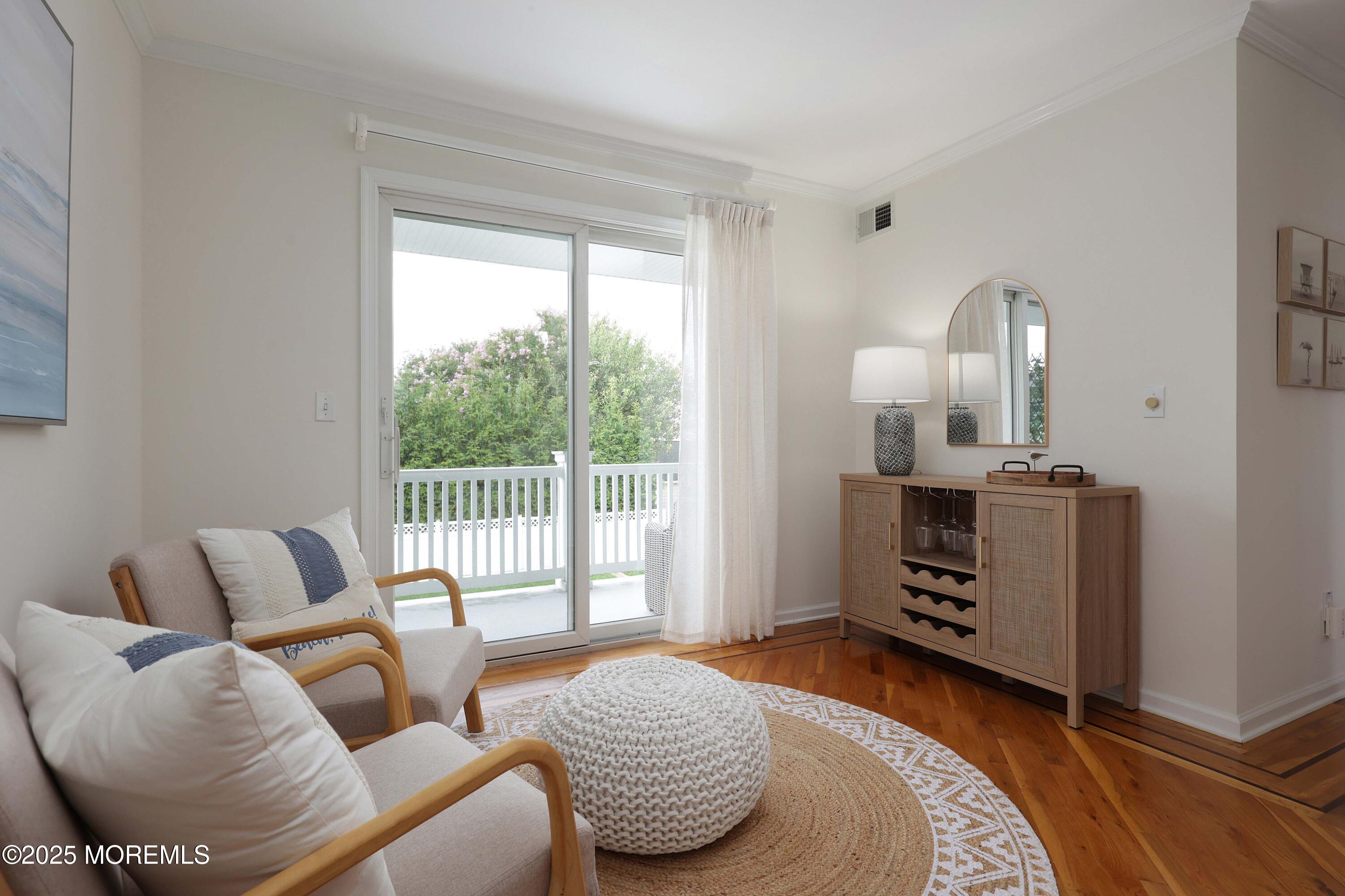 200 2nd Avenue, Unit 14 Belmar, NJ 07719 - Photo 23 of 32 a bedroom with furniture and a window