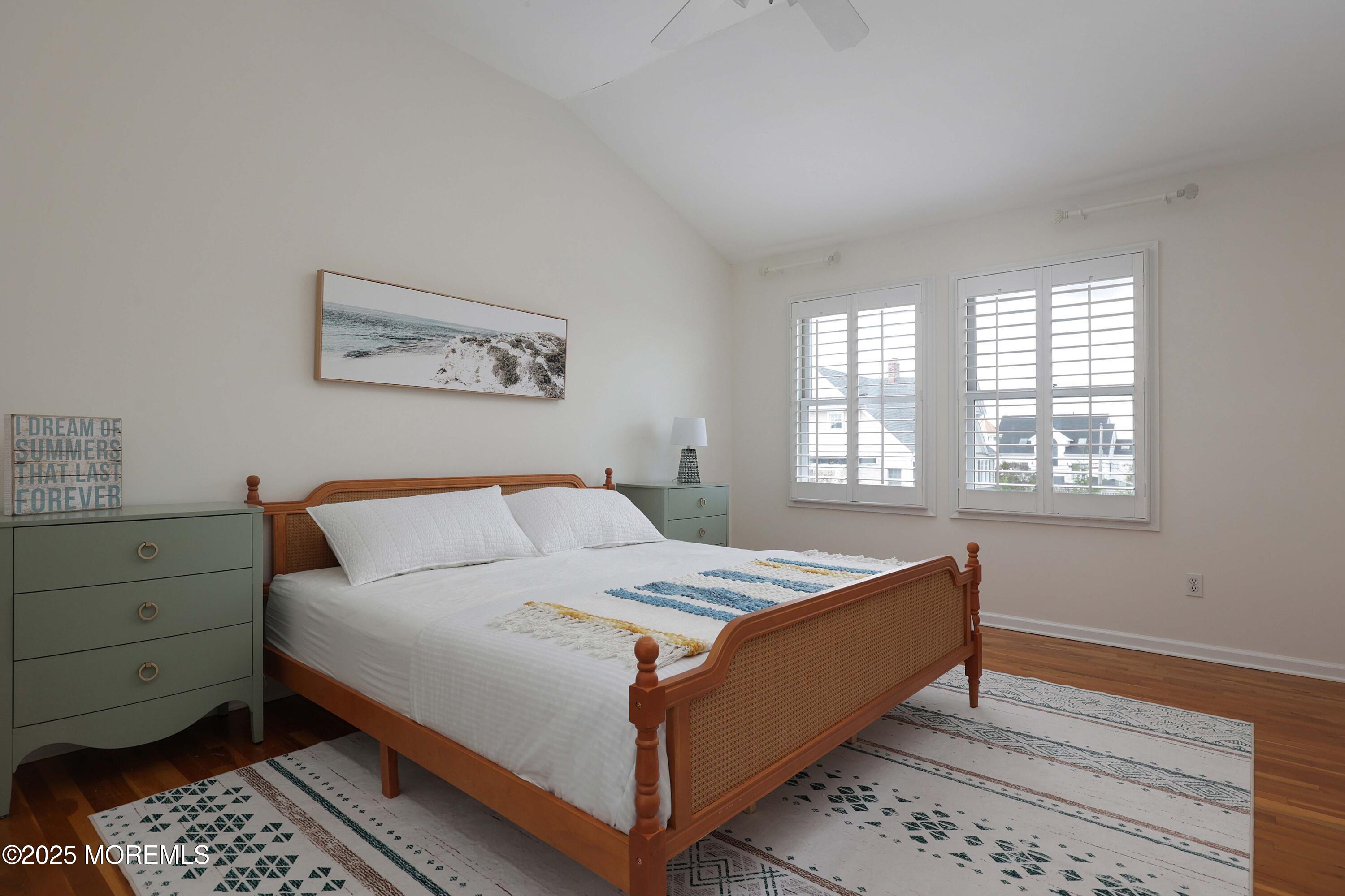 200 2nd Avenue, Unit 14 Belmar, NJ 07719 - Photo 27 of 32 a bedroom with a bed and a window