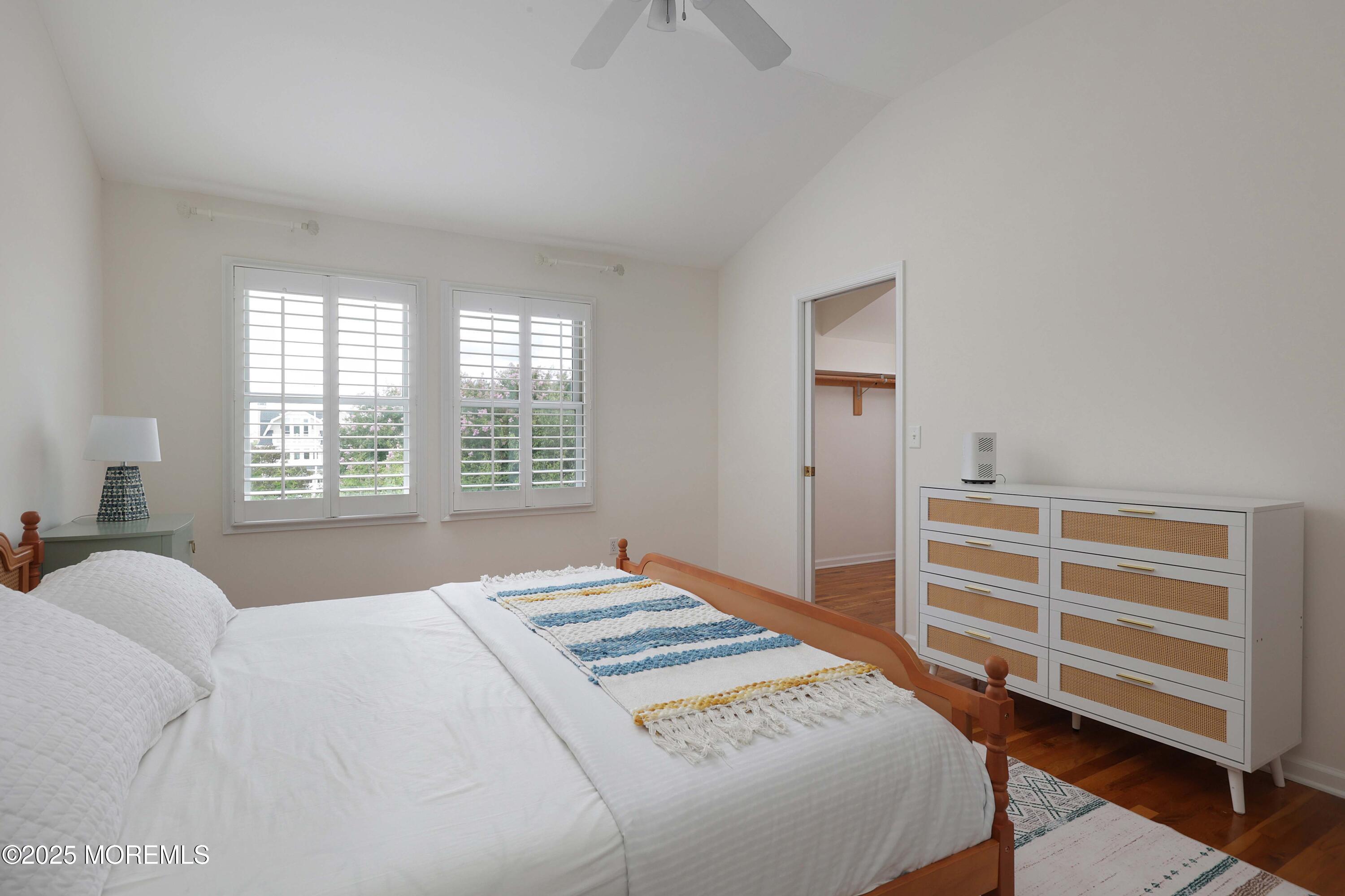 200 2nd Avenue, Unit 14 Belmar, NJ 07719 - Photo 28 of 32 a bedroom with a bed and a window