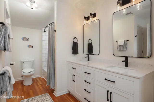 a bathroom with a sink and a shower