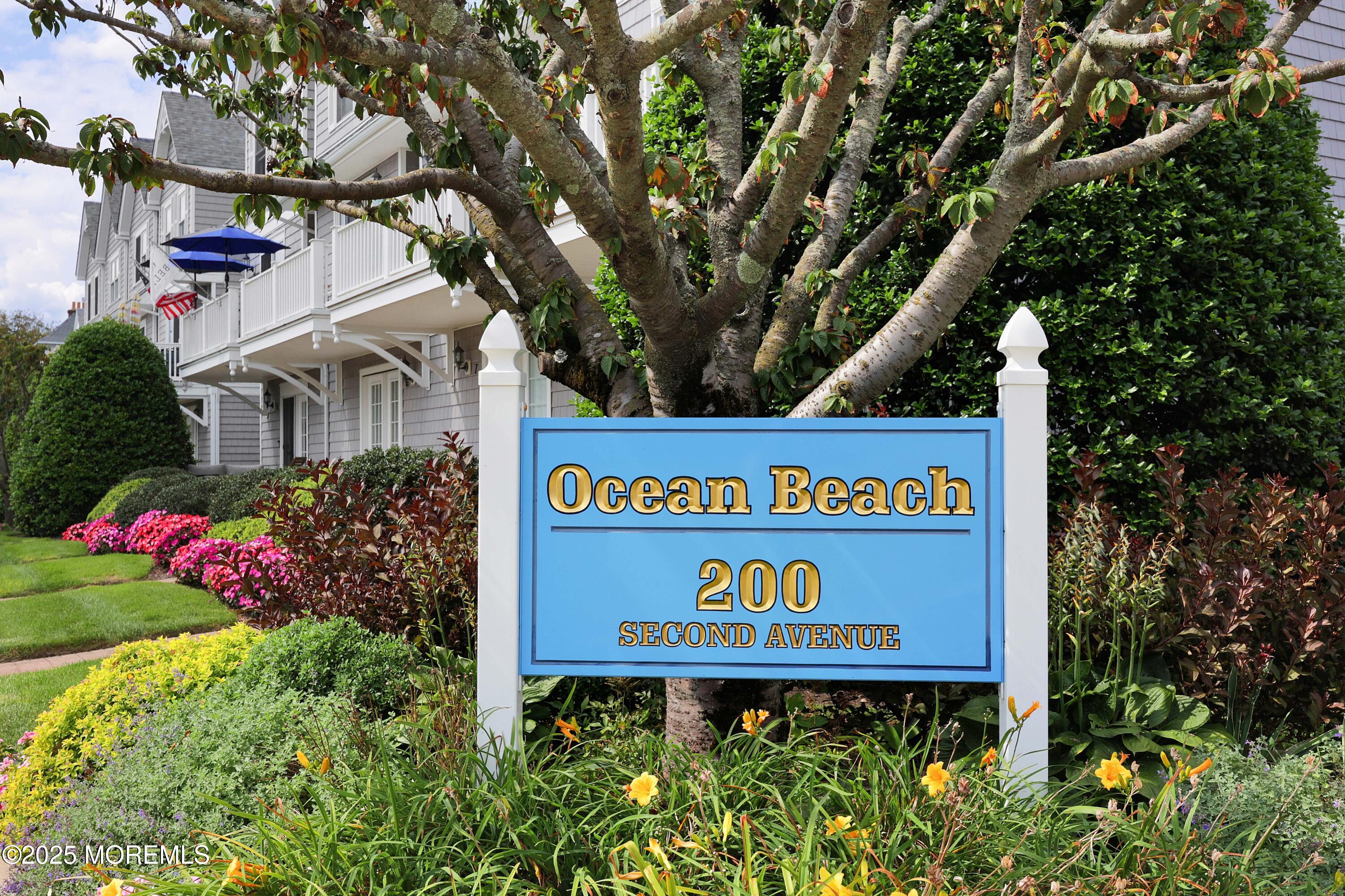 200 2nd Avenue, Unit 14 Belmar, NJ 07719 - Photo 4 of 32 a sign that is on a wooden wall