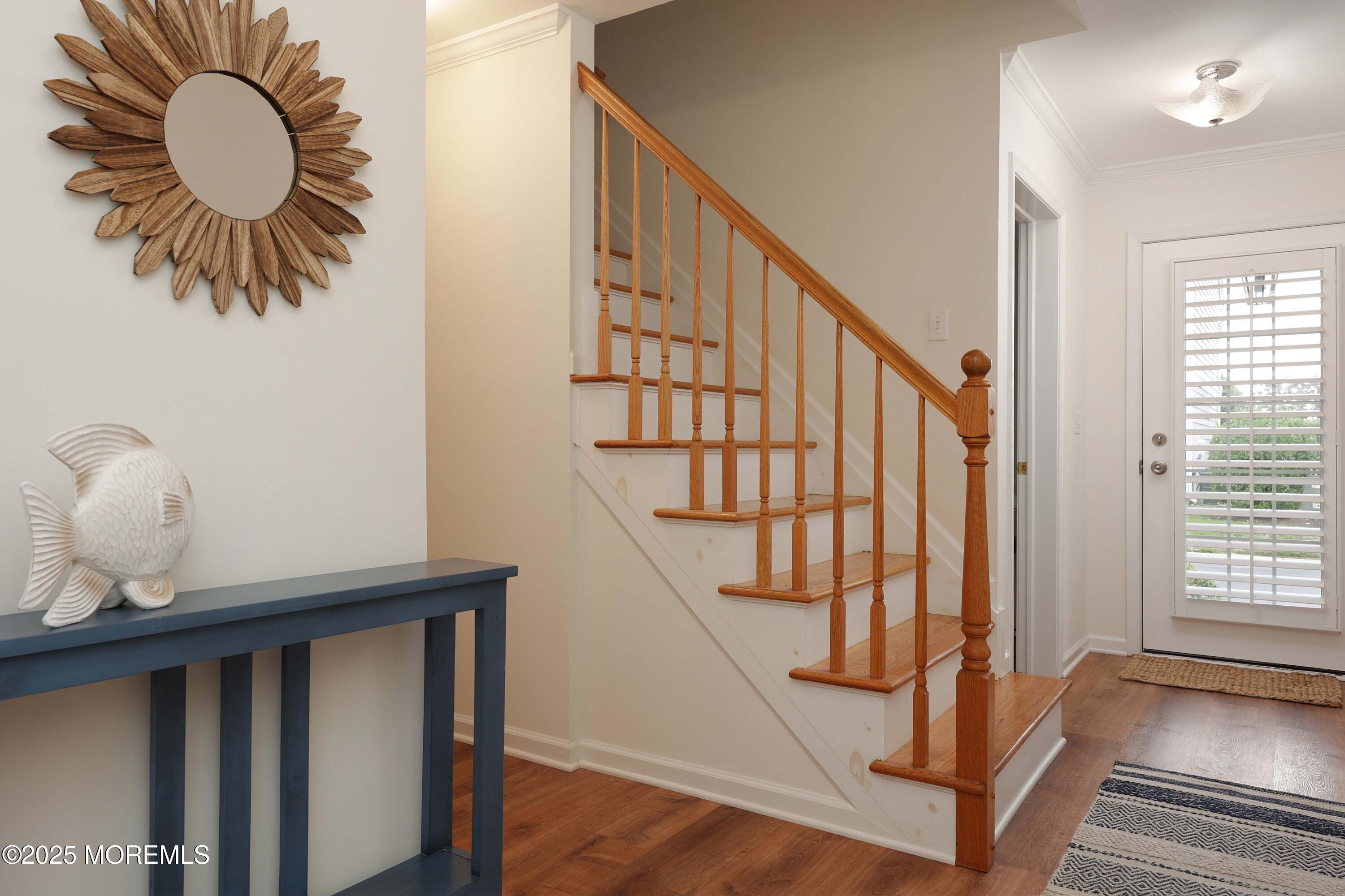200 2nd Avenue, Unit 14 Belmar, NJ 07719 - Photo 9 of 32 a view of entryway and hall with wooden floor