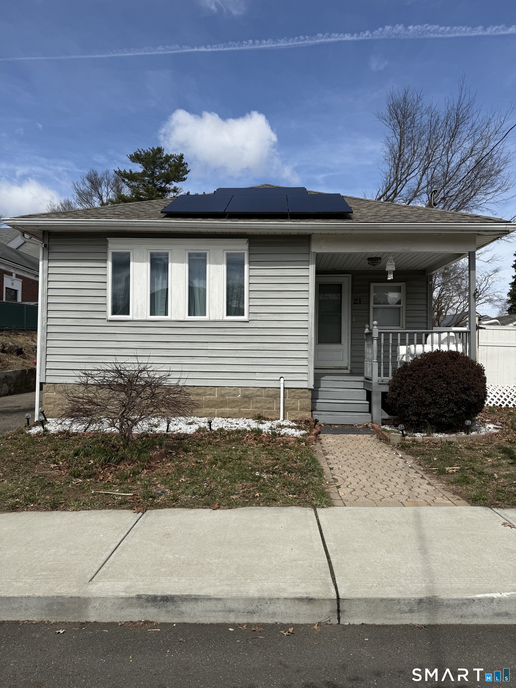 21 Mathew Street Milford, CT 06460 - Photo 1 of 28 a front view of a house with a yard