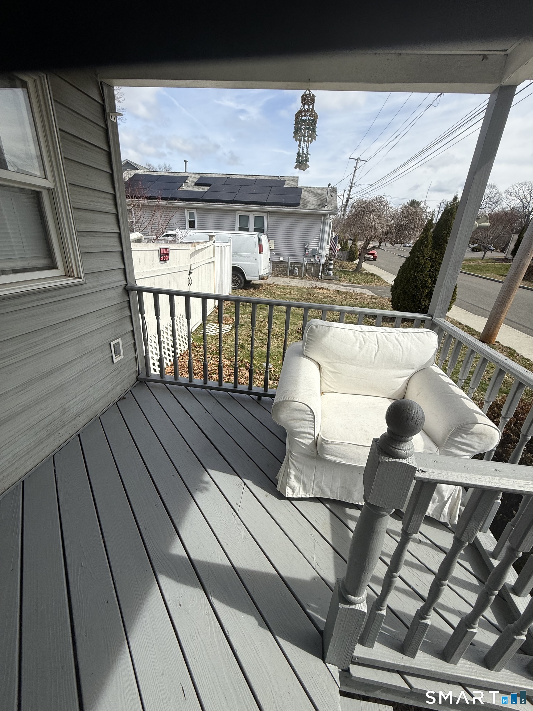 21 Mathew Street Milford, CT 06460 - Photo 3 of 28 a view of balcony and wooden floor