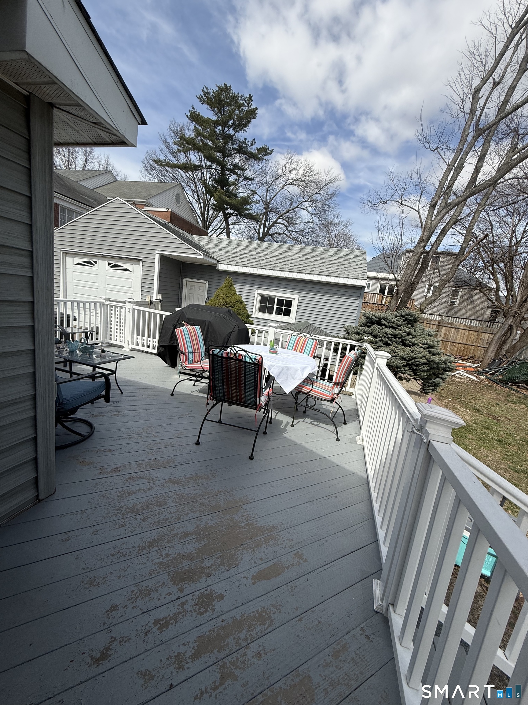 21 Mathew Street Milford, CT 06460 - Photo 4 of 28 a view of a porch with furniture and a yard