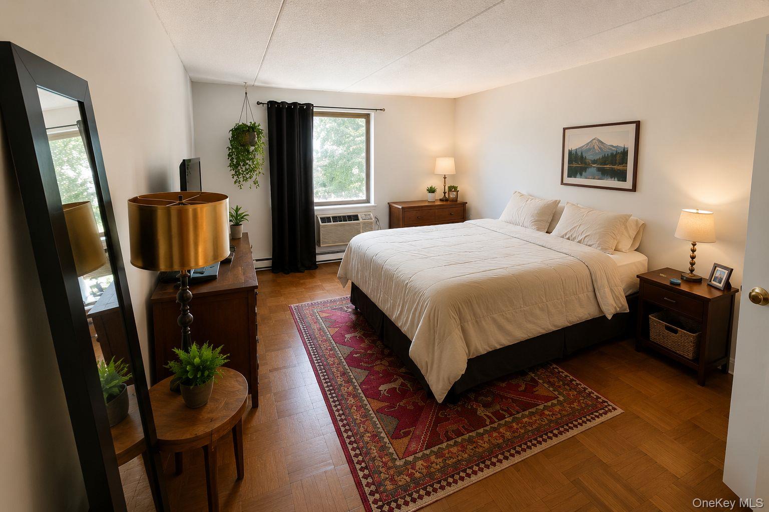 160 Academy Street, Unit 3J Poughkeepsie, NY 12601 - Photo 7 of 14 a bedroom with bed mirror and window