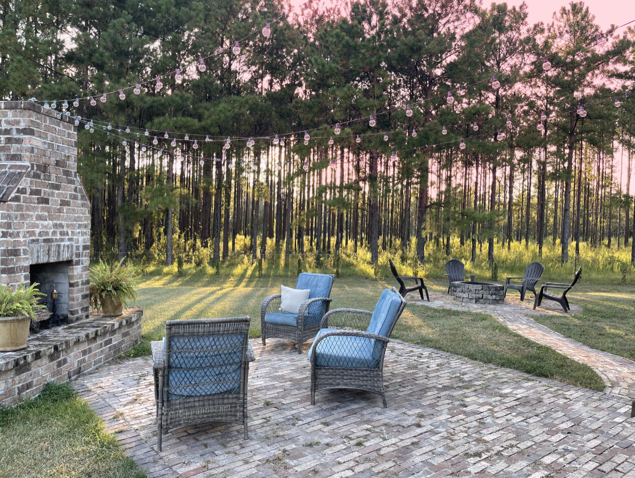 3362 Citrine Circle Crestview, FL 32539 - Photo 23 of 24 a view of a bench in a backyard