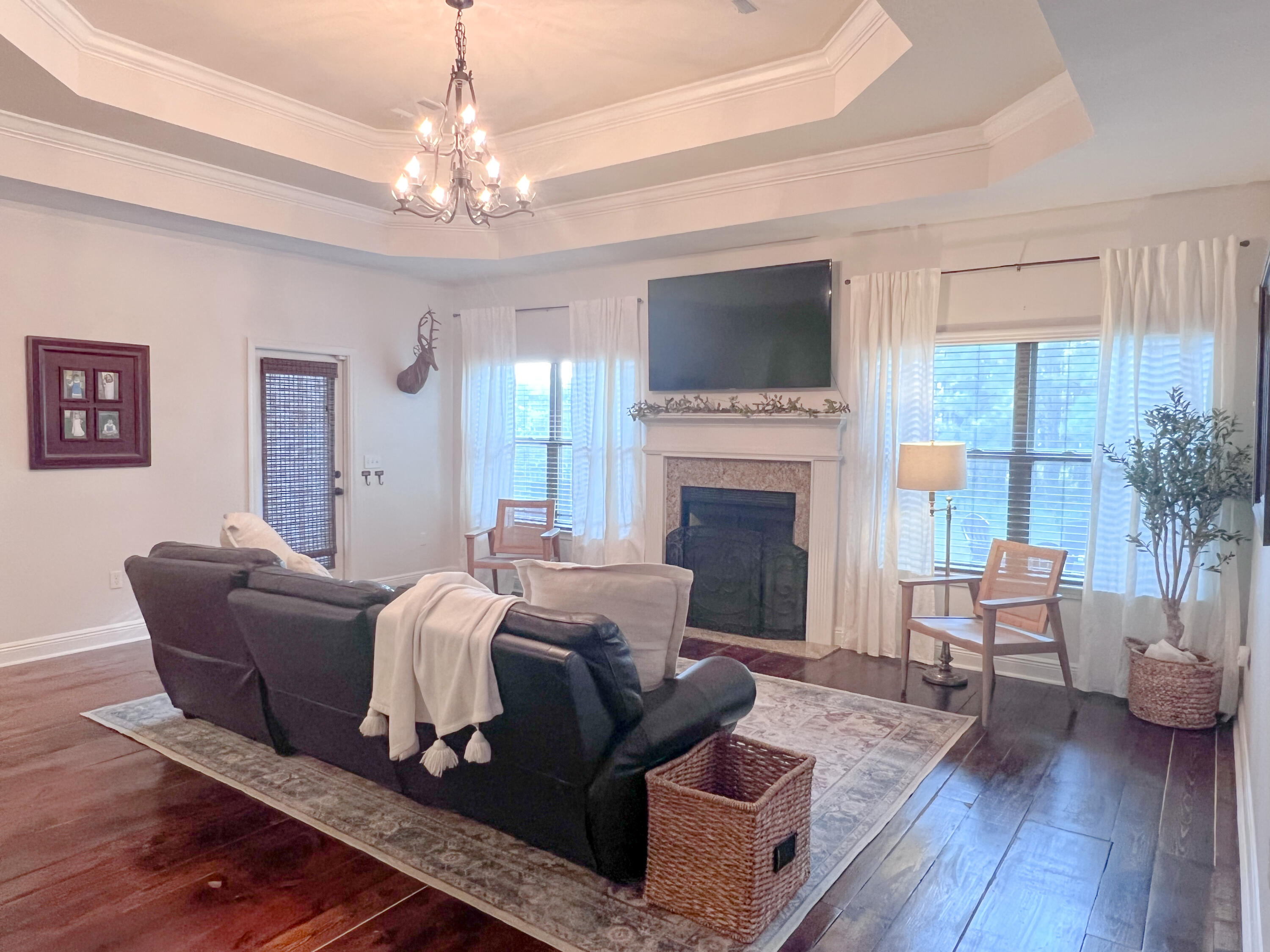 3362 Citrine Circle Crestview, FL 32539 - Photo 3 of 24 a living room with furniture fireplace and a flat screen tv