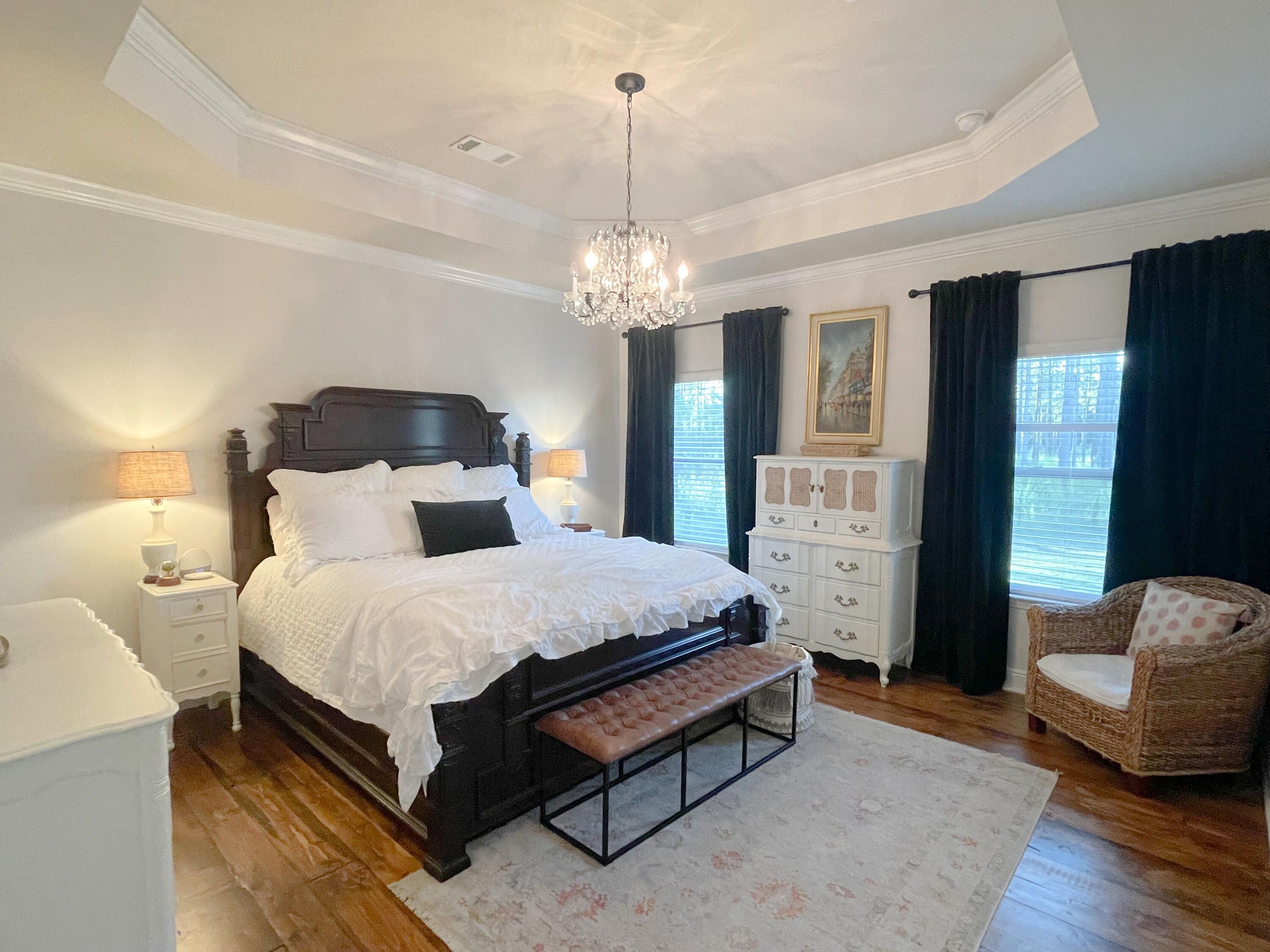 3362 Citrine Circle Crestview, FL 32539 - Photo 4 of 24 a spacious bedroom with a bed and a chandelier