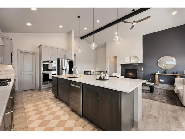 a kitchen with kitchen island granite countertop lots of counter top space