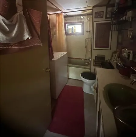 a bathroom with a sink and toilet