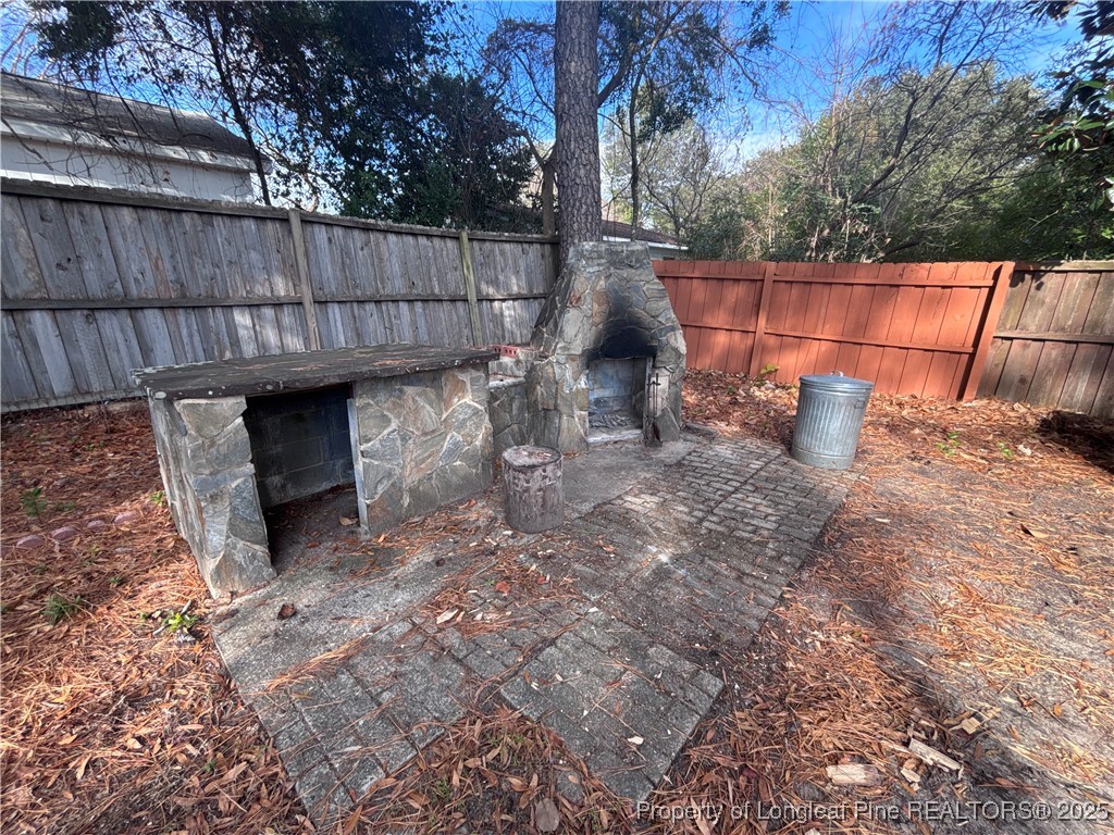 5329 Hampton Road Fayetteville, NC 28311 - Photo 37 of 39 Stone Fireplace and Grill
