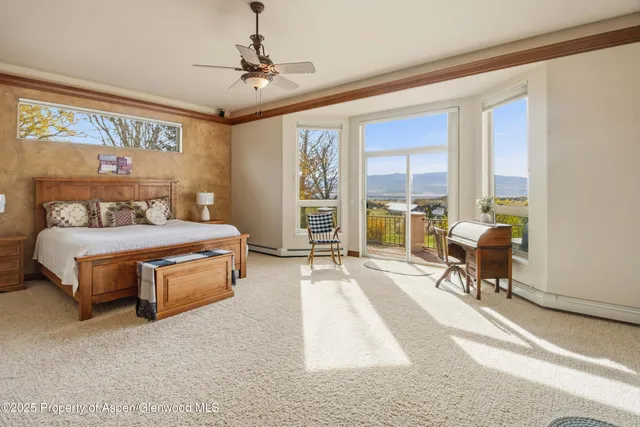 a spacious bathroom with a sink double vanity and a mirror