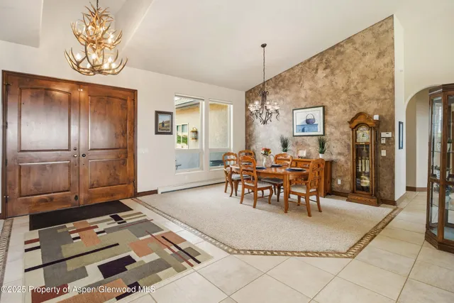 a living room with furniture fireplace and a flat screen tv