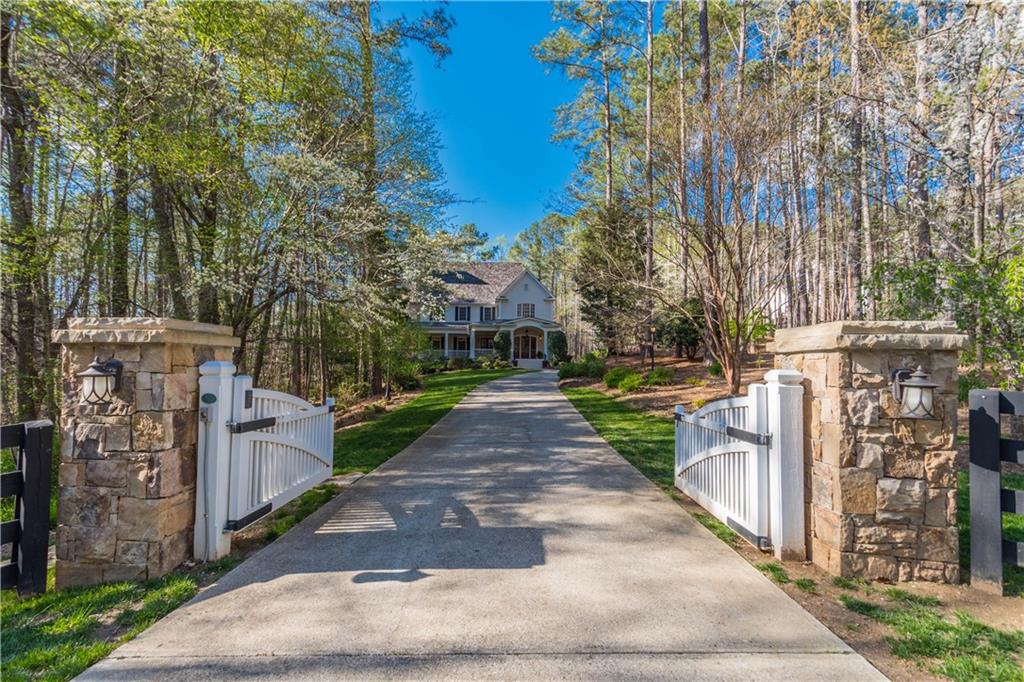 14825 East Bluff Road Milton, GA 30004 - Photo 1 of 1 Front entrance; beautiful drive onto property.
