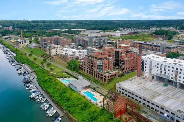 an aerial view of a city with lawn chairs